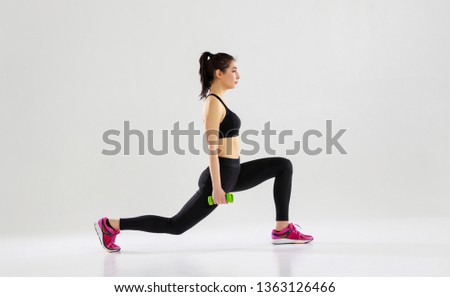 happy young woman doing fitness sports on white background      
