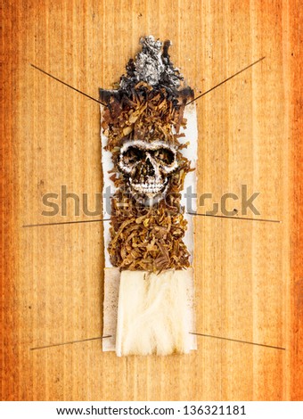 Cigarette concept on wooden background