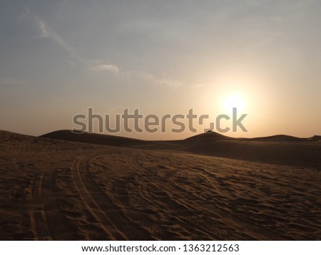 Abu Dhabi, UAE - November 2017: Wheel trails are visible in the beautiful desert