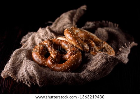 close up of fresh salty pretzels in a basket