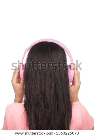 woman listening music in headphones isolated on white background