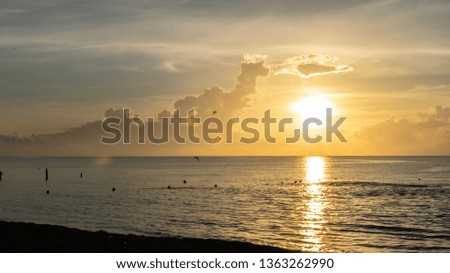 Golden sunrise at the beach in Playa del Carmen, Mexico