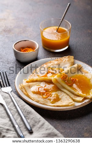 Traditional French crepe Suzette with orange sauce. Royalty-Free Stock Photo #1363290638