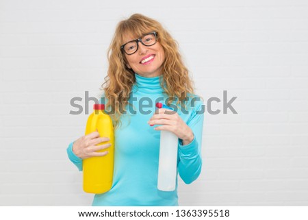 woman with isolated cleaning products