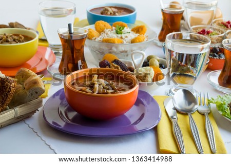 Traditional Turkish Ramadan, iftar Dining Table With Lentil Soups in colorful bowls
