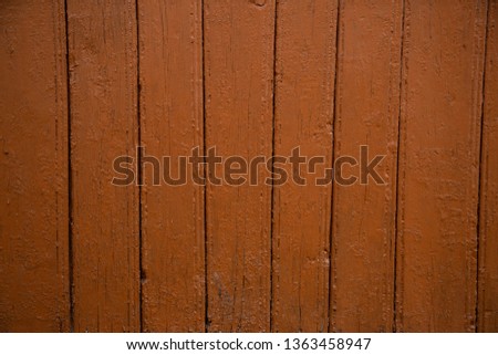 Old wooden background of boards with cracked and peeling paint