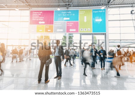 Crowd of people at a trade show