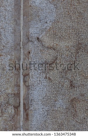 Vertical joining of two wall tiles in natural stone. Can be used as background.