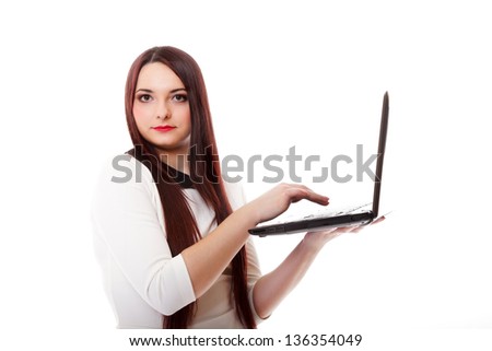 Young business woman working on laptop computer isolated on white background