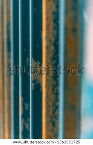 Close up of weathered old rusted metal slats that could be used as a texture or grunge background