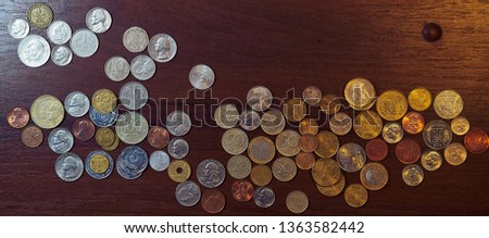 Photos of various coins laid out in the form of Russia