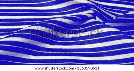 silk striped fabric. blue white stripes. This beautiful, super soft, medium-sized silk blend is perfect for your design projects. It is brushed on the back for a luxurious feeling.