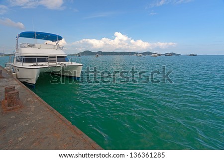 Boat at berth waiting for tourists, Andaman Sea, Thailand.