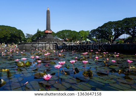Tugu Malang as the main landmark of Malang City in East Java, Indonesia Royalty-Free Stock Photo #1363647158