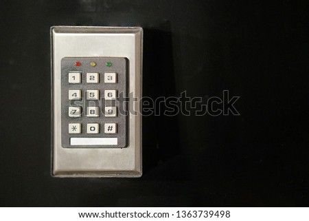 Secure password on keyboard for opening home house door isolated on black background. Password code Security keypad system protected in Public Building. Security code combination to unlock the door