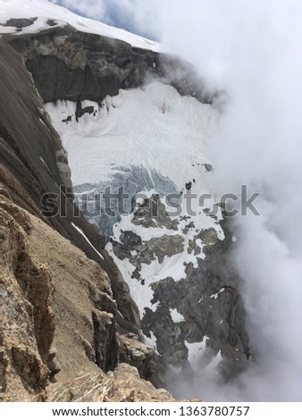 Mountain with snow in the cloud; Glacier 3000; Switzerland 
