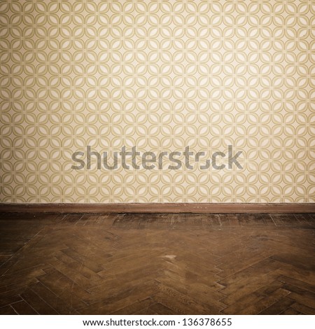 Vintage room, empty retro apartment with old fashioned wallpaper and weathered wooden parquet floor, toned Royalty-Free Stock Photo #136378655