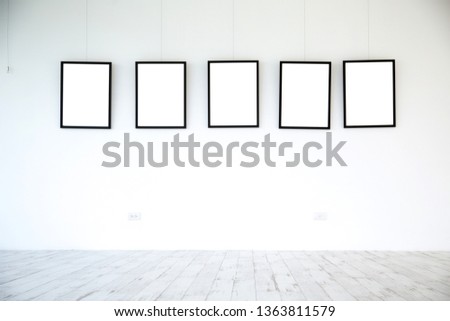 blank photo frame on wall