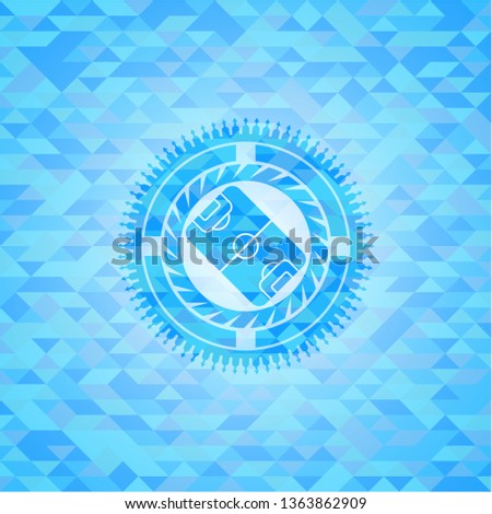 football field icon inside sky blue emblem. Mosaic background