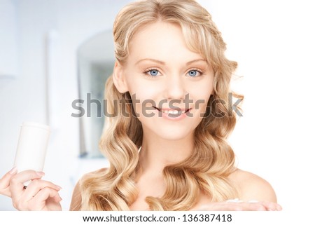 picture of young woman with pills at home