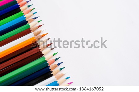 Colored pencils on a white background, with space for your text, blank for banner