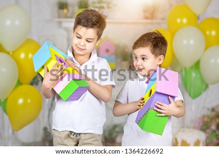 Boys brothers in Easter decorations