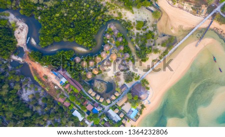 Aerial top view, Resort and beach with emerald blue water on beautiful tropical sea in thailand