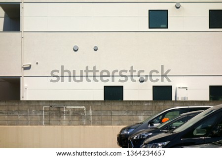 The form of the city. The exterior wall of building and car park                               
