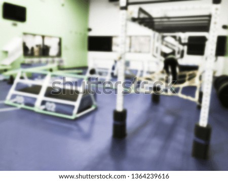 Blurred motion kid fitness class with gymnastic equipments in America