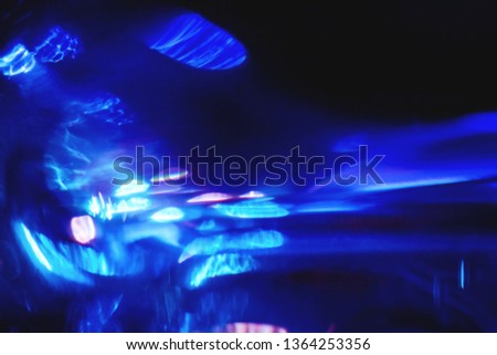 Abstract dynamic dark blue soft focused futuristic techno bokeh background