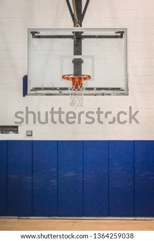 Highschool Gym Basketball Hoop Royalty-Free Stock Photo #1364259038