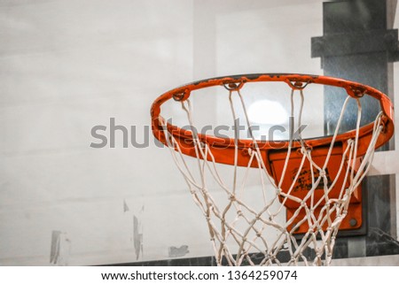 Highschool Gym Basketball Hoop Royalty-Free Stock Photo #1364259074