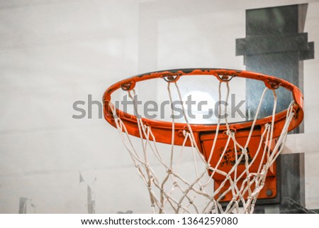 Highschool Gym Basketball Hoop Royalty-Free Stock Photo #1364259080