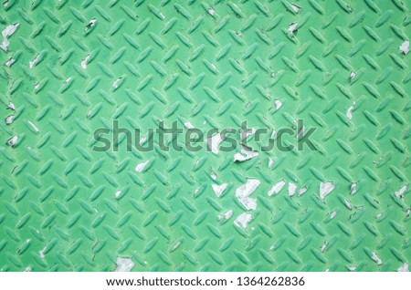 background of metal diamond plate in green color