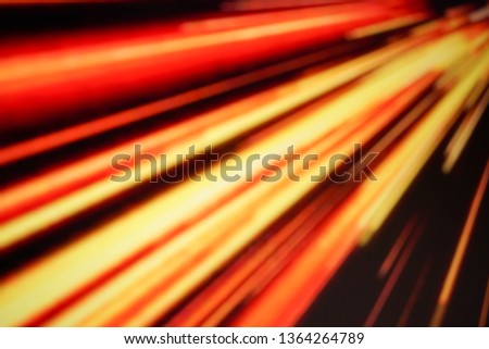 Blurred explosion light texture. Abstract diagonal red orange explosion background.