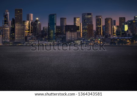 Sydney urban cityscape skyline night scene with empty asphalt floor, modern city in business district with tar road