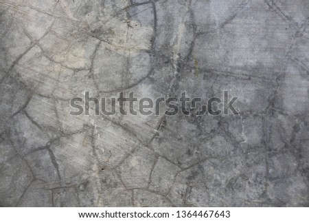 Surface and pattern of cracked concrete wall. Gray background