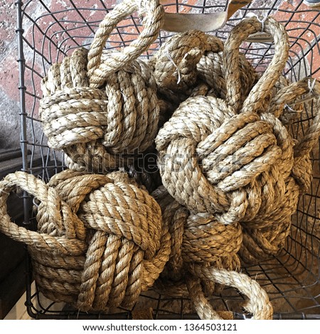 looking down at balls of decorative nautical ropes