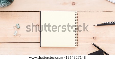 Top view on blank notebook on a table.