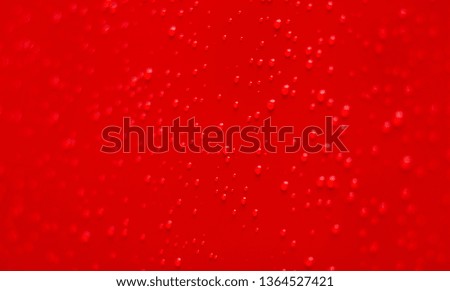 vivid red color metal surface background with wet rain drops objects wallpaper patter graphic design picture with empty copy space for text