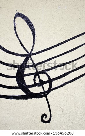 Musical staff with notes drawn on the wall, art deco