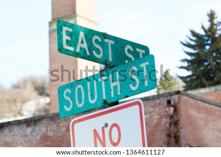 East and south street signs