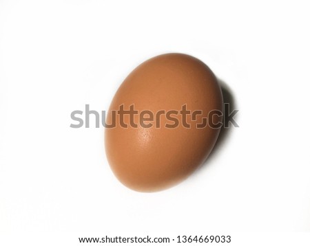 One red egg on white background