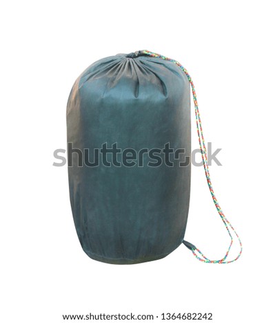 Old sleeping bag isolated on a white background with clipping path , vertical
