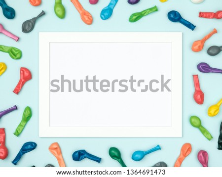 Party or birthday background. Frame with colorful balloons. Table top view. Flat lay. Holiday mockup. Greeting card with copy space