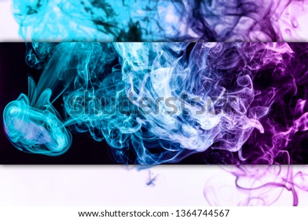 Frozen abstract movement of  explosion pink and blue  smoke multiple colors on black  and white background. Background from the smoke of vape
