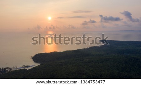 Aerial view  Landscape of paradise tropical island beach, sunset shot