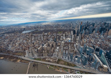 Wide angle aerial view of Midtown Manhattan and Central Park from helicopter, New York City.