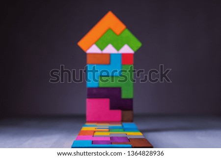 Abstract house of wooden puzzles. Business concept, sale, mortgage, rent.
