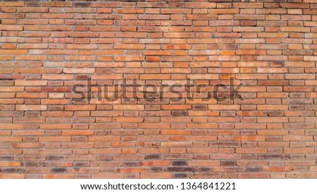 Red brick wall pattern background May be used in interior design and the surface of old brick walls of red stone blocks as wall surfaces Copy area suitable for graffiti inscription